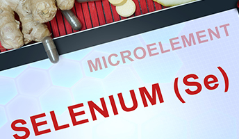 A document displaying "SELENIUM (Se)" and "MICROELEMENT," surrounded by ginger and health supplements.